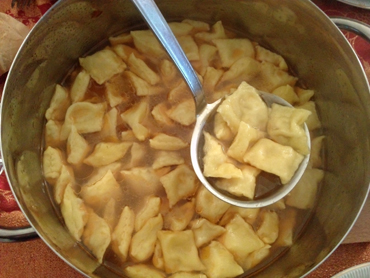 Raviolini in brodo